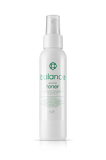 White bottle of Candee Skin Brand balance toner with green text on a white background
