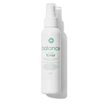 White bottle of Candee Skin Brand balance toner with a green logo on a white background