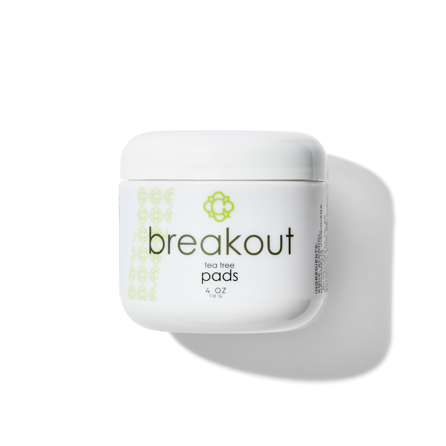 White container of Candee Skin Brand 'breakout' tea tree pads on a white background