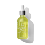 Bottle of Candee Skin Brand 'brighten' post wax oil with dropper on a white background
