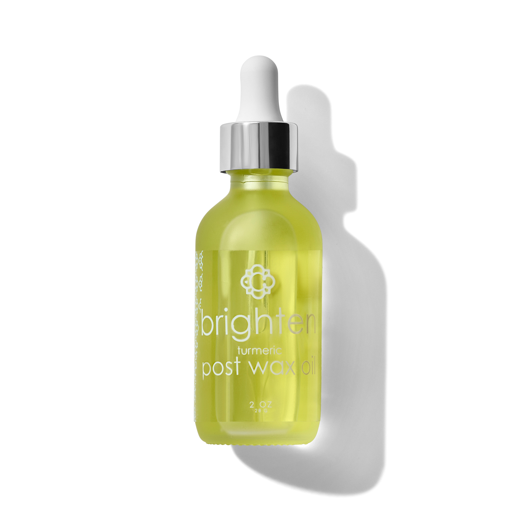 Bottle of Candee Skin Brand 'brighten' post wax oil with dropper on a white background