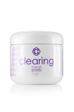 White container Candee Skin Brand' clearing' with purple text on a white background