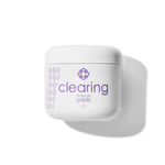 White container Candee Skin Brand 'clearing' with purple text on a white background
