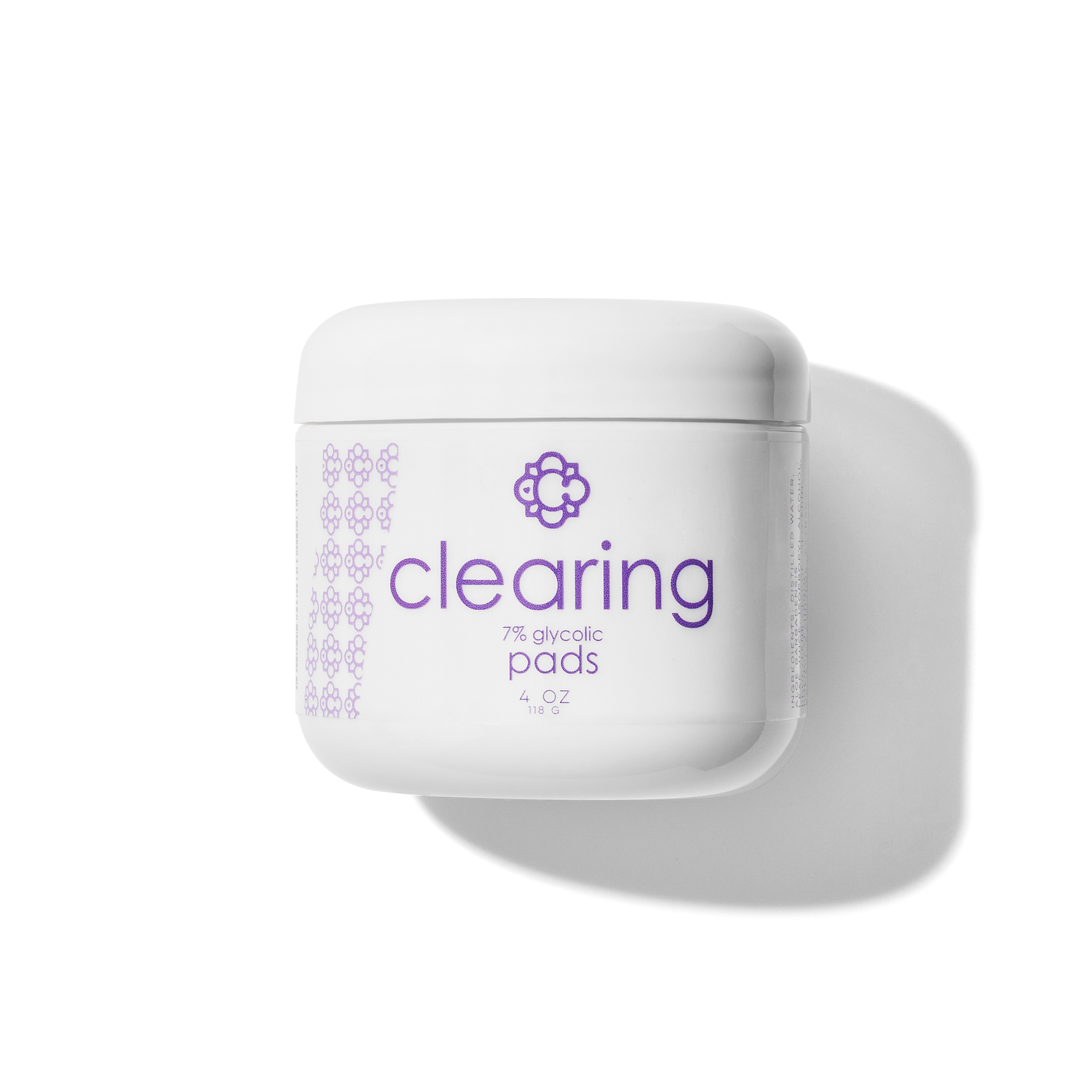 White container Candee Skin Brand 'clearing' with purple text on a white background