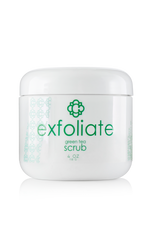Jar of Candee Skin Brand green tea scrub with 'exfoliate' text on a white background