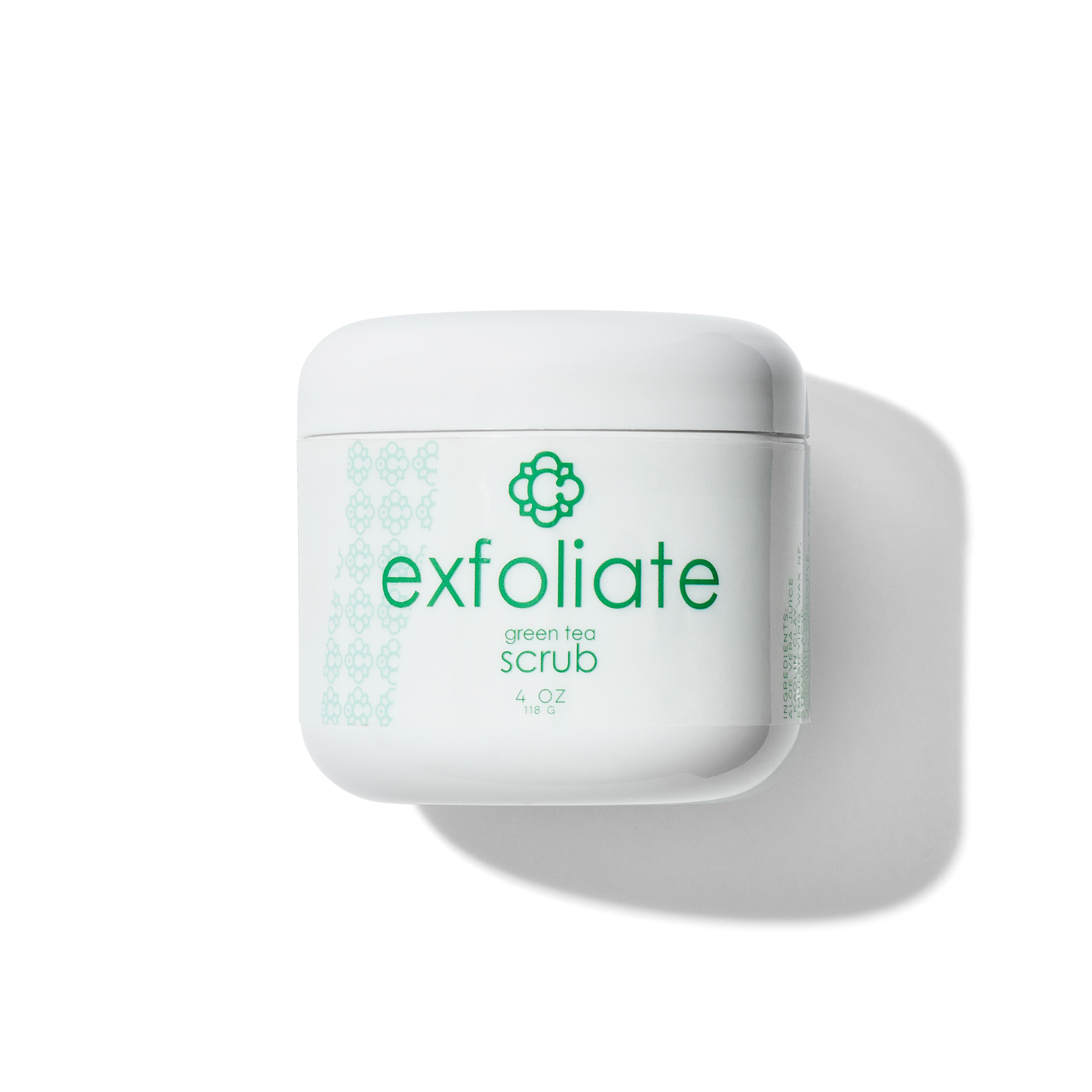 White container of Candee Skin Brand green tea scrub with 'exfoliate' text on a white background
